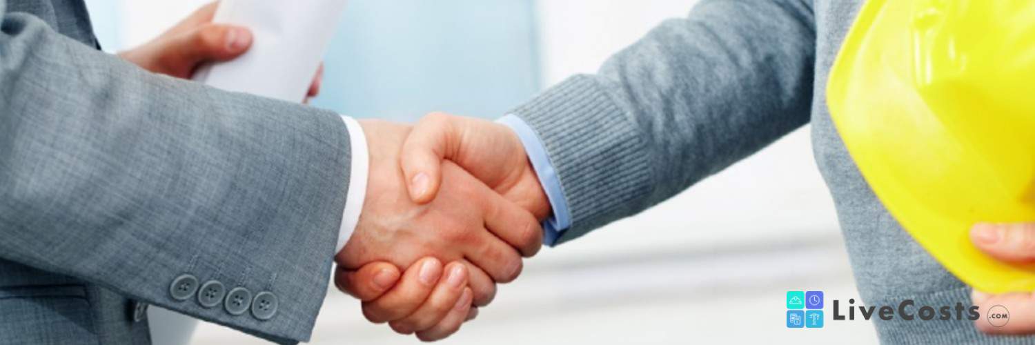 Man shakes hands with another man after the completion of a construction project